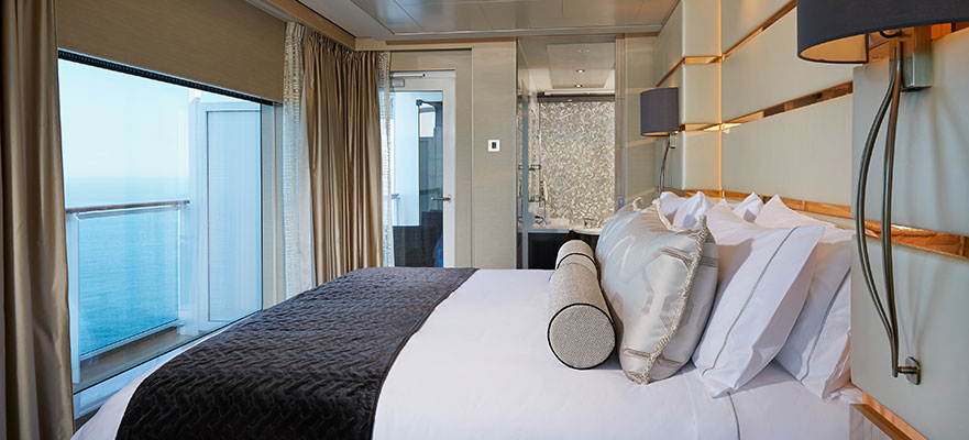 NCL Bliss Haven-Deluxe-Owners-Suite-Bedroom.jpg